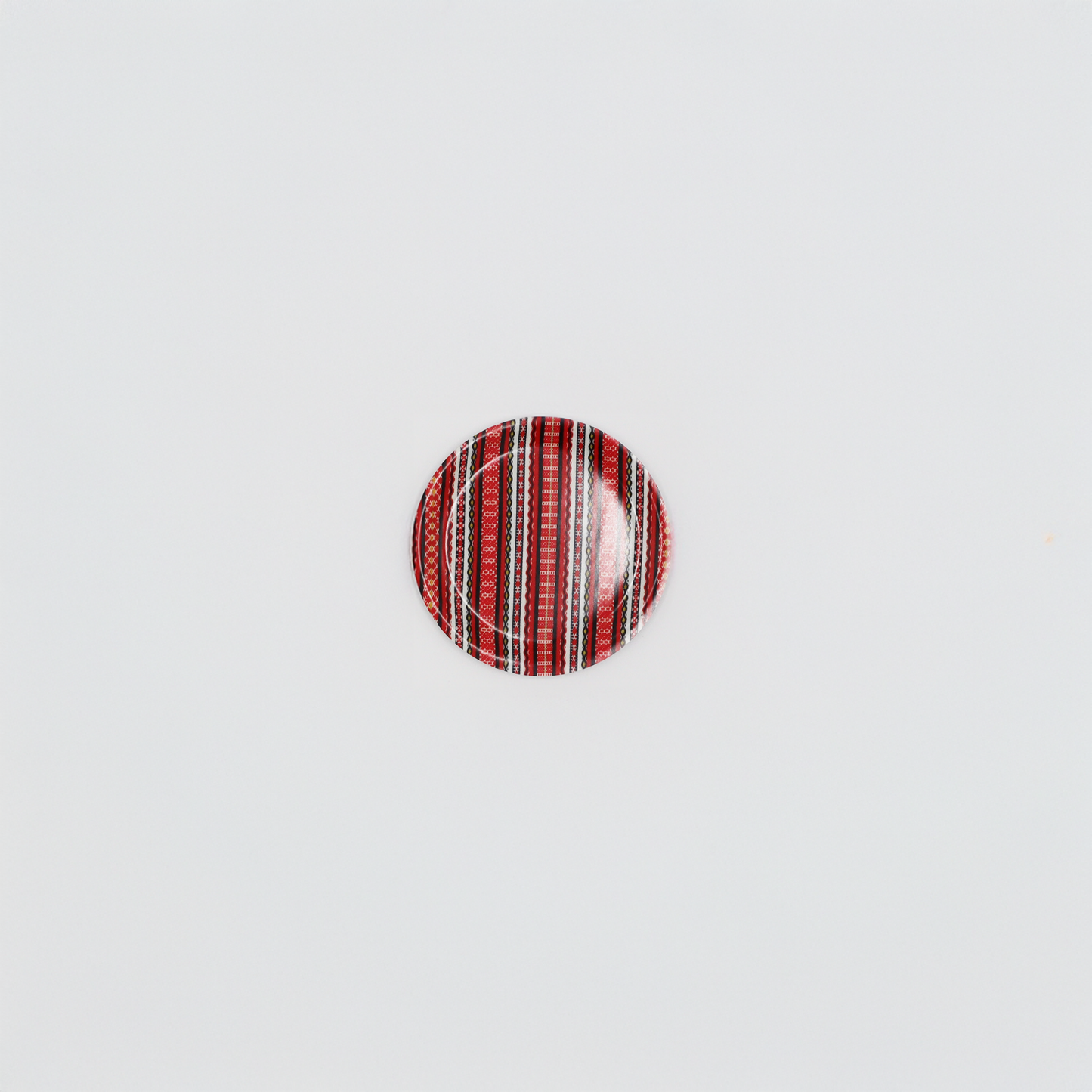 Glasunderlägg Tina dekorativ dalainspirerad design.